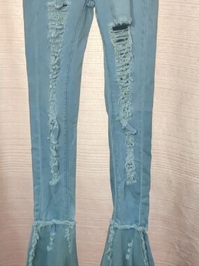 Light Blue Distressed Flare Jeans with Frayed Seams